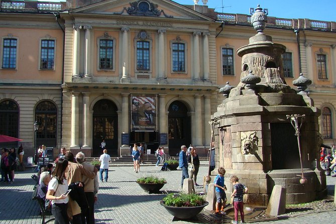 Stockholm Old Town and the Vasa Museum, a Small Group Walking Tour. - Royal Palace courtyard: guards, uniforms, and a harbour viewpoint